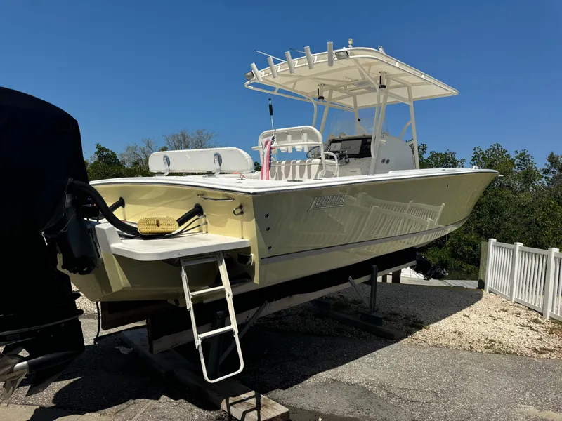 Slide: The Image of 2006 Jupiter 31 CC boat with Mercury engines docked. - 4