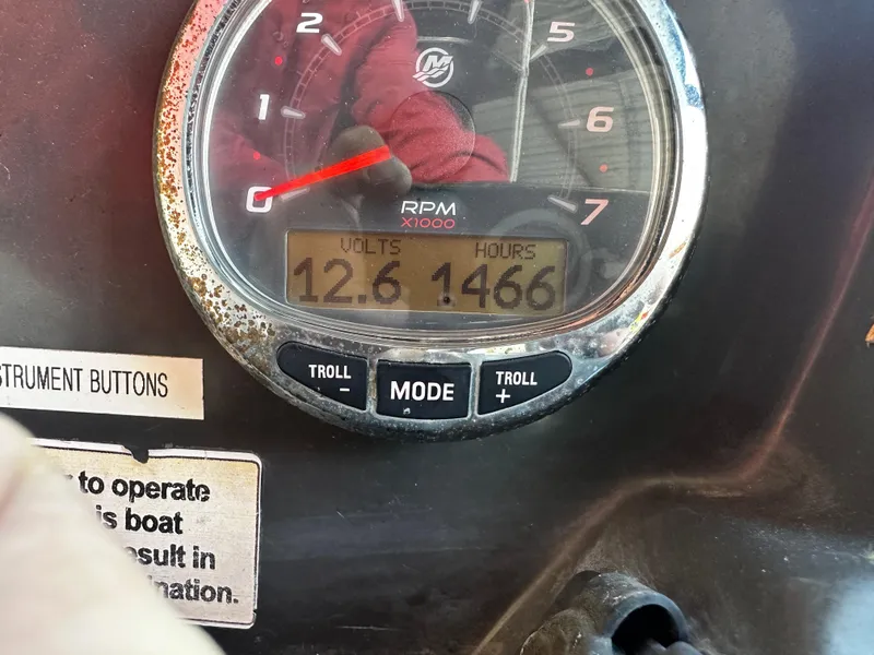 Slide: The Image of Instrument panel of 2021 Bayliner VR6 Bowrider OB showing 12.6 volts and 1466 hours. - 18