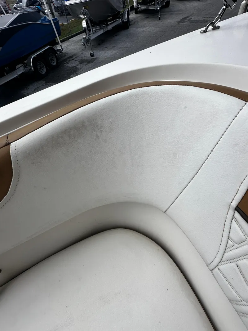 Slide: The Image of 2021 Bayliner VR6 Bowrider OB interior seating detail with white upholstery. - 27