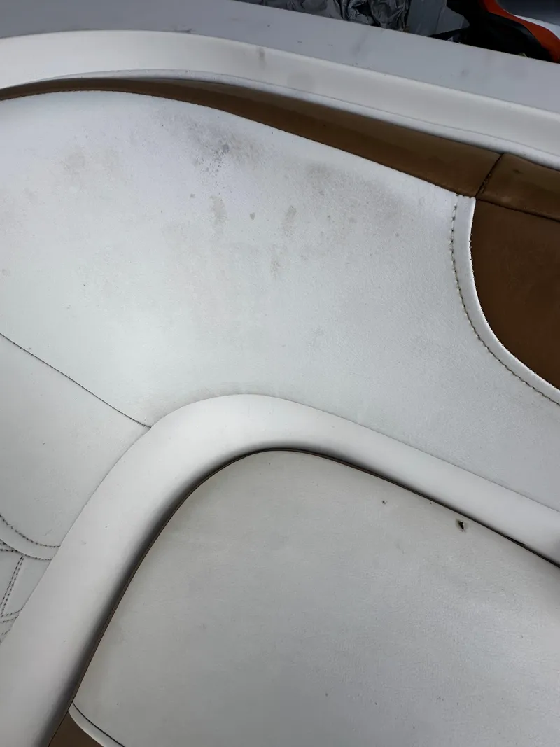 Slide: The Image of 2021 Bayliner VR6 Bowrider OB interior with white leather seating. - 28