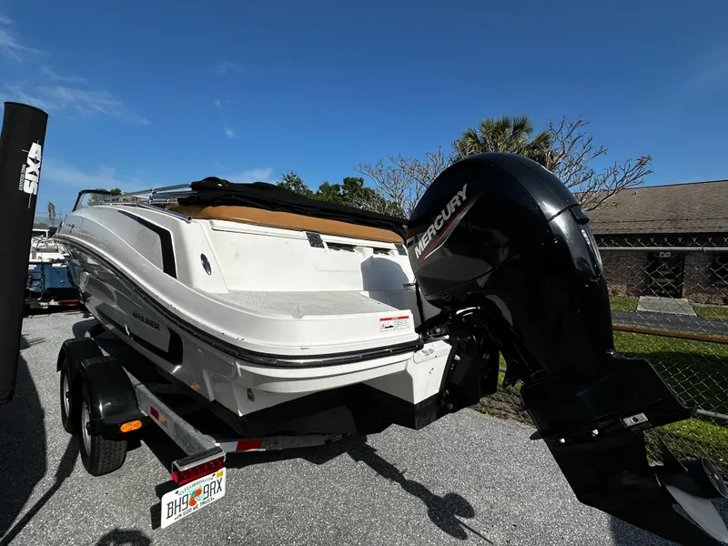 Slide: The Image of 2021 Bayliner VR6 Bowrider OB on trailer with Mercury outboard motor. - 4