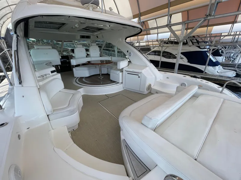 Slide: The Image of 2008 Sea Ray 550 Sundancer yacht interior with luxurious seating and elegant design. - 21
