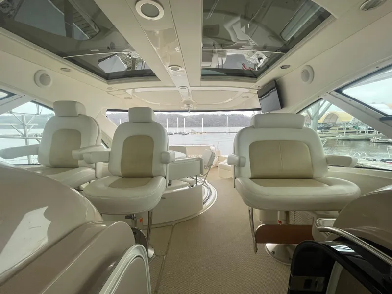 Slide: The Image of Luxurious interior of a 2008 Sea Ray 550 Sundancer yacht with plush seating. - 26