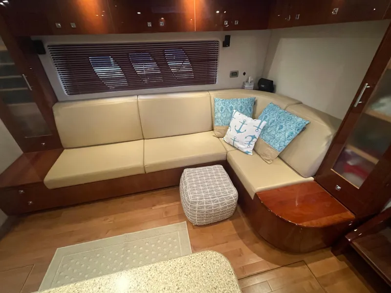 Slide: The Image of Luxurious interior of 2008 Sea Ray 550 Sundancer with beige seating and nautical-themed cushions. - 37