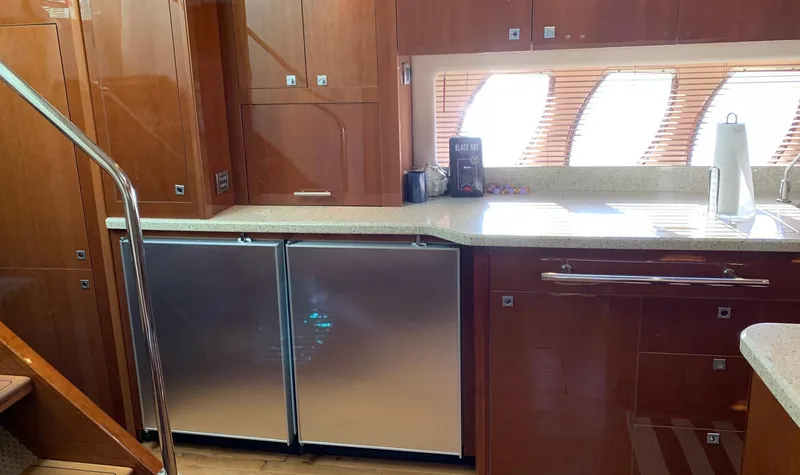 Slide: The Image of Luxurious kitchen interior of 2008 Sea Ray 550 Sundancer yacht with modern appliances. - 40