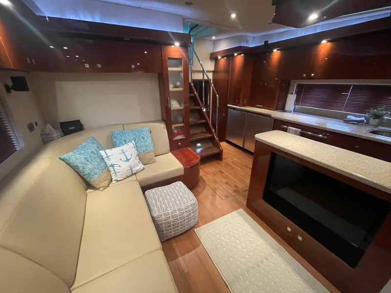 Slide: The Image of Luxurious interior of 2008 Sea Ray 550 Sundancer yacht with modern furnishings and elegant design. - 42