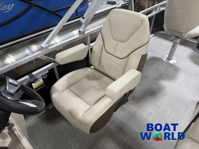 Slide: The Image of Luxurious captain's chair in 2025 Tahoe Sport 2385 Rear Fish boat interior. - 12