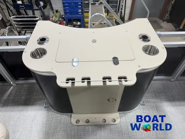 Slide: The Image of 2025 Tahoe Sport 2385 Rear Fish boat console with cup holders and storage. - 19