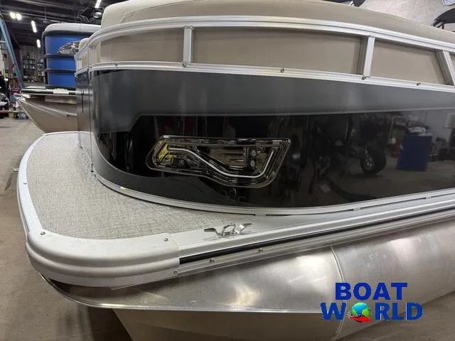 Slide: The Image of 2025 Tahoe Sport 2385 Rear Fish boat with Honda 4-Stroke EFI engine, showcased at Boat World. - 29