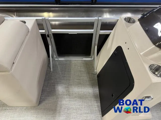 Slide: The Image of 2025 Tahoe Sport 2385 Rear Fish interior with seating and console, featuring Boat World logo. - 35