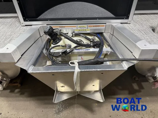 Slide: The Image of 2025 Tahoe Sport 2385 Rear Fish boat fuel compartment with Honda 4-Stroke EFI engine components. - 38