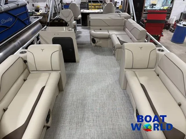 Slide: The Image of 2025 Tahoe Sport 2385 Rear Fish interior with beige seating, spacious layout, and modern design. - 7