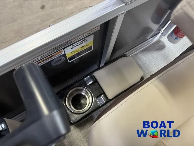 Slide: The Image of Interior view of 2025 Tahoe Sport 2385 boat with cup holder and seating. - 16