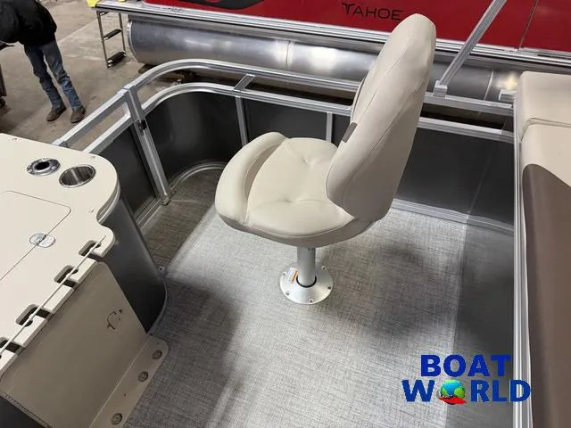 Slide: The Image of 2025 Tahoe Sport 2385 Rear Fish boat interior with swivel chair and fishing station. - 20