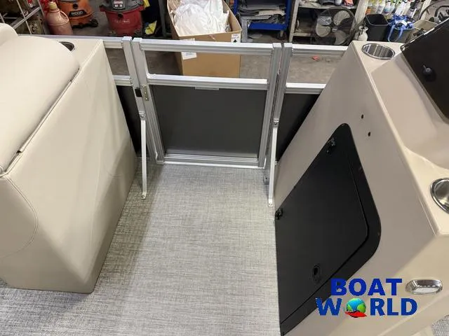 Slide: The Image of 2025 Tahoe Sport 2385 Rear Fish interior with Honda 4-Stroke EFI, featuring seating and storage. - 25