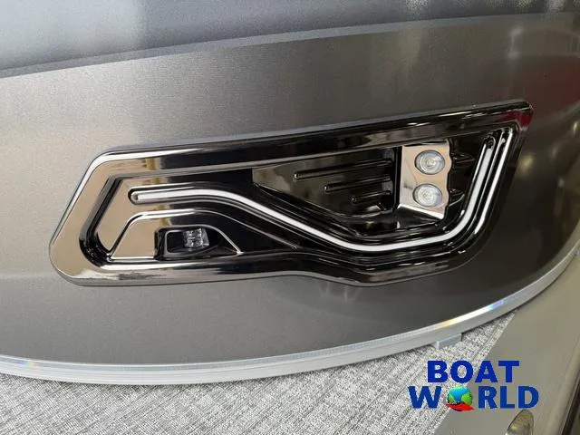 Slide: The Image of 2025 Tahoe Sport 2385 Rear Fish boat detail with sleek design and modern lighting. - 30