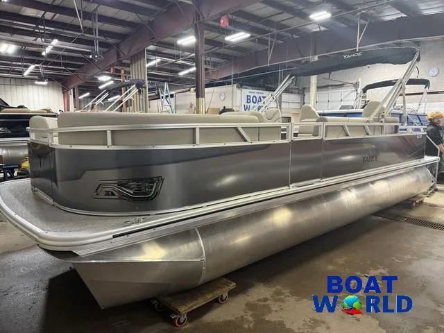 Slide: The Image of 2025 Tahoe Sport 2385 pontoon boat in showroom, featuring Honda 4-Stroke EFI engine. - 31