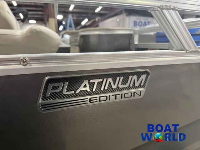 Slide: The Image of 2025 Tahoe Sport 2385 Platinum Edition boat at Boat World showroom. - 33