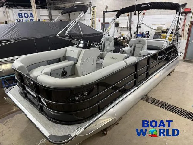 Slide: The Image of 2025 Bentley Pontoons Legacy 220 Swingback with Honda 4-Stroke EFI in showroom. - 1