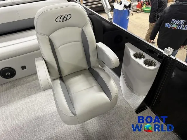 Slide: The Image of 2025 Bentley Pontoons Legacy 220 Swingback seat with cup holders, showcased at Boat World. - 10