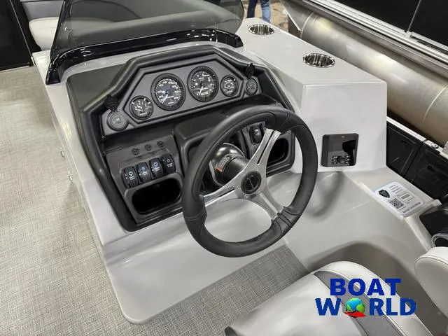 Slide: The Image of 2025 Bentley Pontoons Legacy 220 Swingback dashboard with steering wheel and controls. - 13