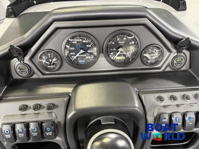 Slide: The Image of Dashboard of 2025 Bentley Pontoons Legacy 220 Swingback with Honda 4-Stroke EFI controls. - 15