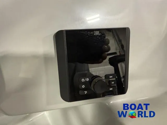 Slide: The Image of 2025 Bentley Pontoons Legacy 220 Swingback audio control panel, featuring JBL system, at Boat World. - 17