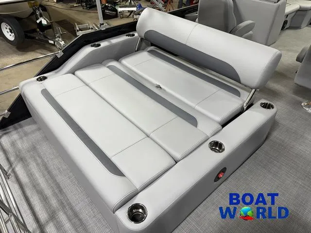 Slide: The Image of 2025 Bentley Pontoons Legacy 220 Swingback interior with gray seating and cup holders. - 20