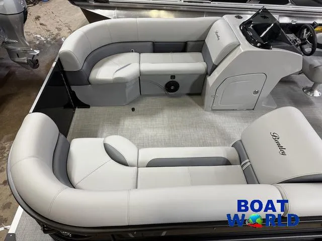 Slide: The Image of 2025 Bentley Pontoons Legacy 220 Swingback interior with Honda 4-Stroke EFI engine, showcased at Boat World. - 3