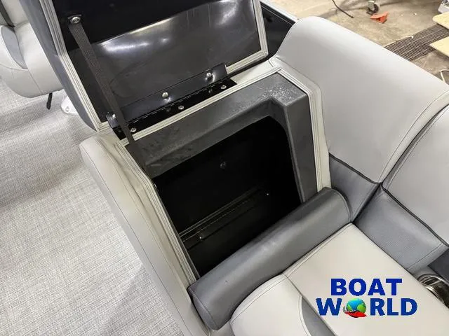 Slide: The Image of 2025 Bentley Pontoons Legacy 220 Swingback seat storage compartment, featuring Honda 4-Stroke EFI. - 30