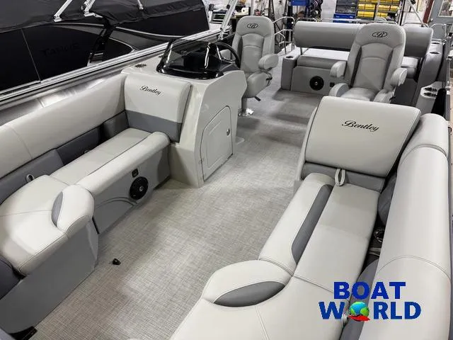 Slide: The Image of 2025 Bentley Pontoons Legacy 220 Swingback interior with luxurious seating and modern design. - 31