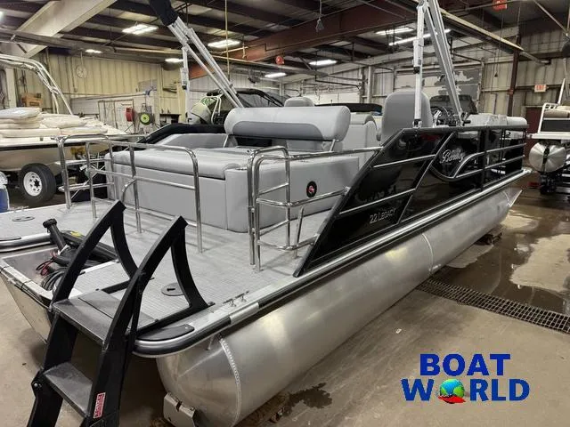 Slide: The Image of 2025 Bentley Pontoons Legacy 220 Swingback in showroom, featuring Honda 4-Stroke EFI engine. - 40