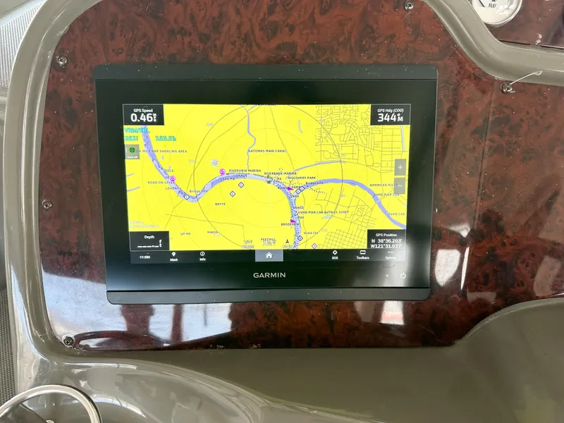 Slide: The Image of Garmin navigation display on 2007 Regal Commodore 3760 IO boat dashboard. - 13