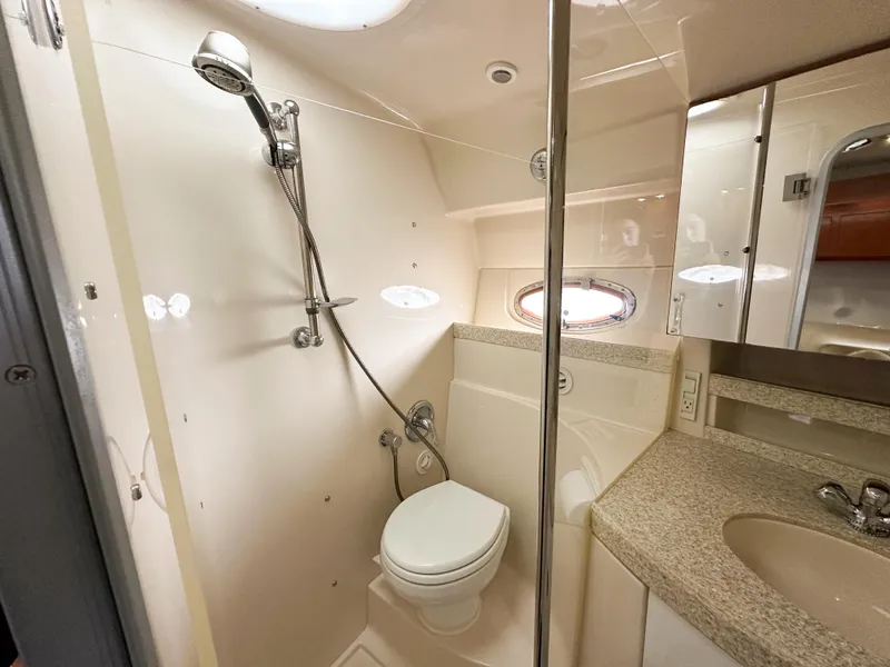 Slide: The Image of 2007 Regal Commodore 3760 IO bathroom with shower, toilet, and sink. - 25