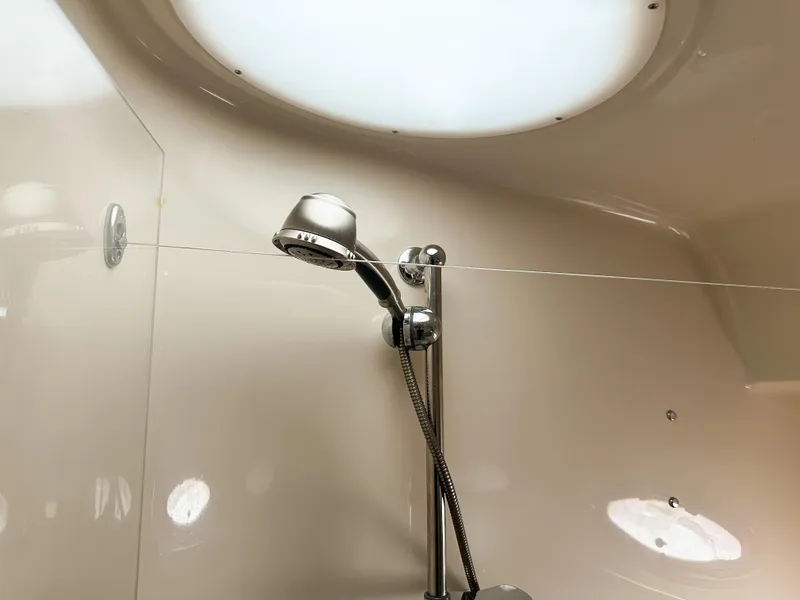 Slide: The Image of Shower area inside 2007 Regal Commodore 3760 IO boat, featuring modern fixtures. - 28