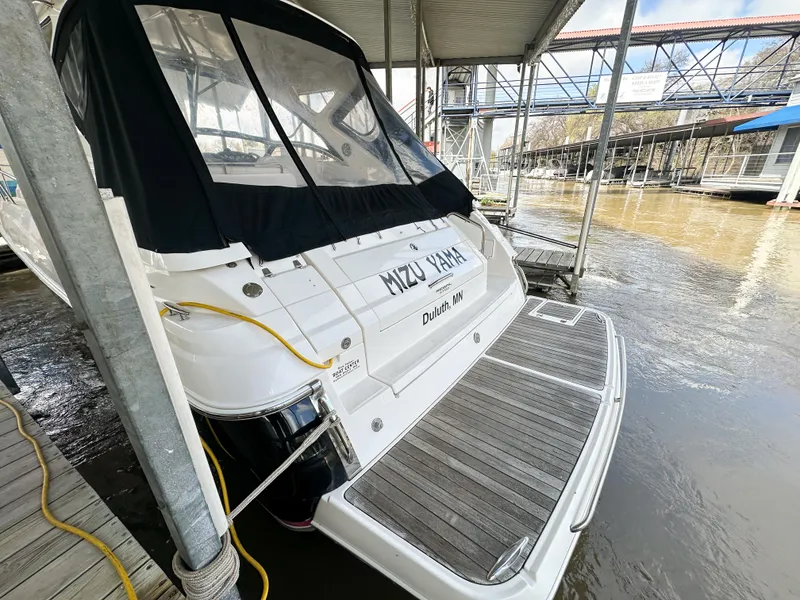 Slide: The Image of 2007 Regal Commodore 3760 IO docked, rear view with covered deck, Duluth, MN. - 3