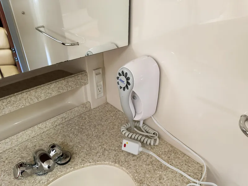 Slide: The Image of Wall-mounted hairdryer in a 2007 Regal Commodore 3760 IO bathroom. - 30
