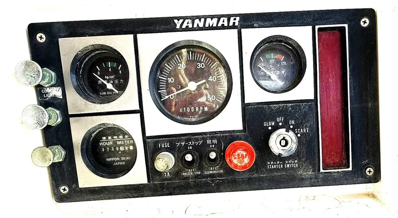 Slide: The Image of Yanmar engine control panel with gauges and switches, Cabo Rico Pearl Edition, 2000 model. - 11