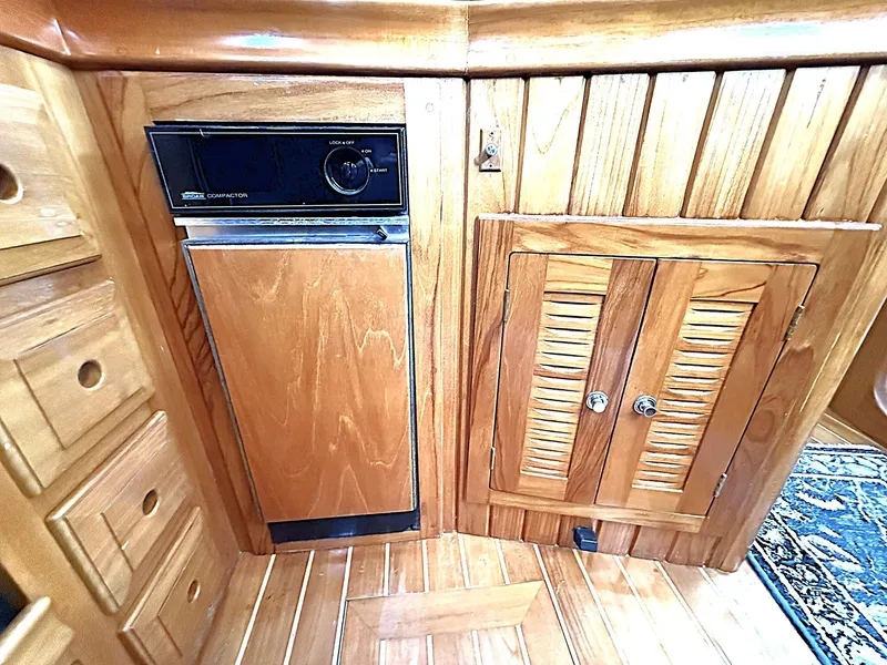 Slide: The Image of Wooden interior of 2000 Cabo Rico Pearl Edition yacht with built-in appliances. - 31