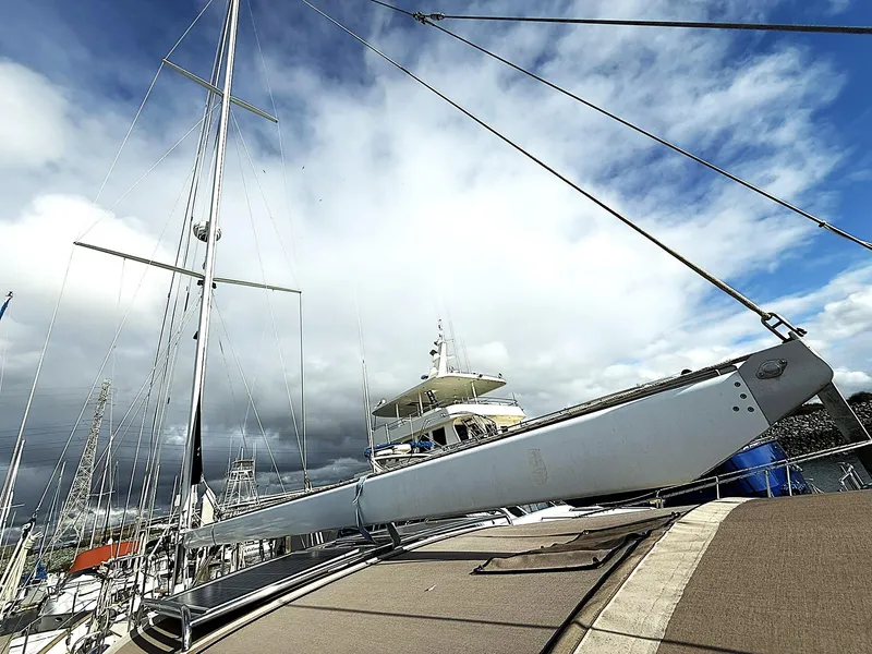 Slide: The Image of Sailboat docked under cloudy sky, Cabo Rico Pearl Edition Anniversary Special, 2000 model. - 45