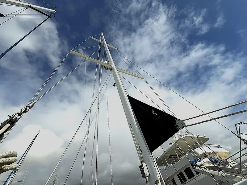 Slide: The Image of Sailboat mast against cloudy sky, Cabo Rico Pearl Edition Anniversary Special, 2000 model. - 47