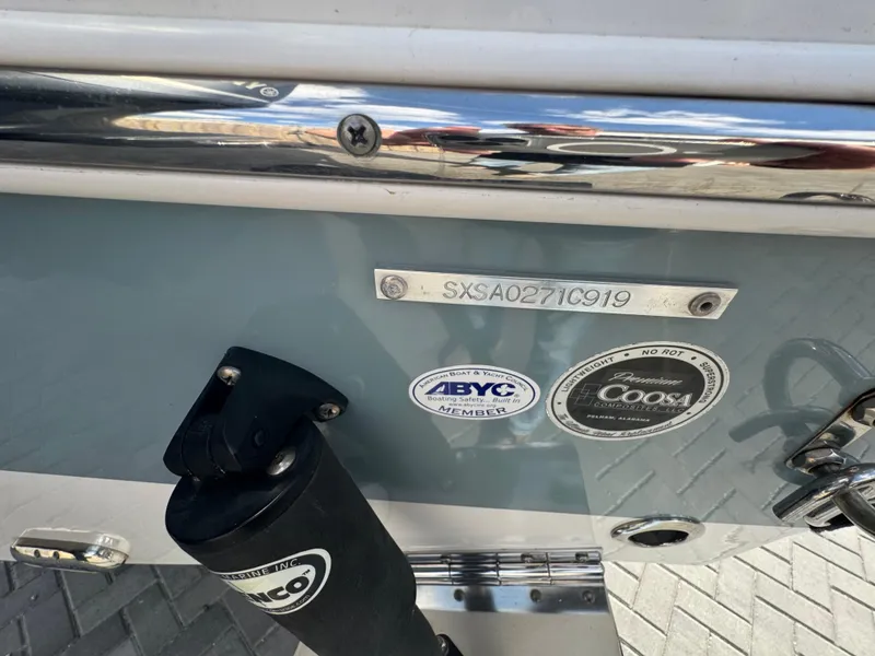 Slide: The Image of 2019 Sea Hunt 235 SE boat with identification plate and certification stickers. - 17