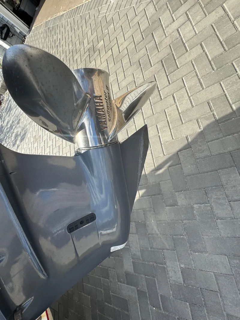 Slide: The Image of Propeller of 2019 Sea Hunt 235 SE boat on paved surface. - 20