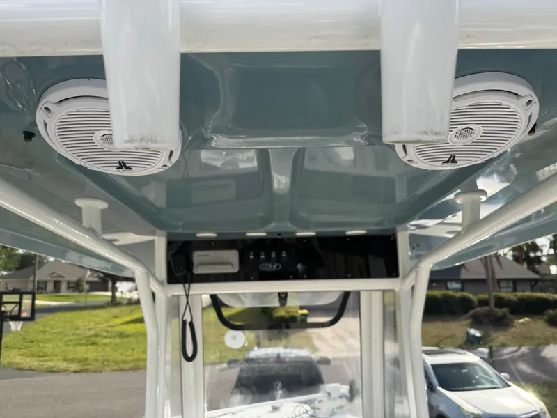 Slide: The Image of 2019 Sea Hunt 235 SE boat interior with speakers and control panel. - 33