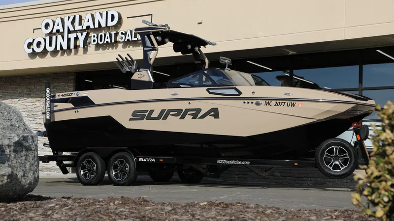 Slide: The Image of 2023 Supra SL boat displayed at Oakland County Boat Sales. - 16