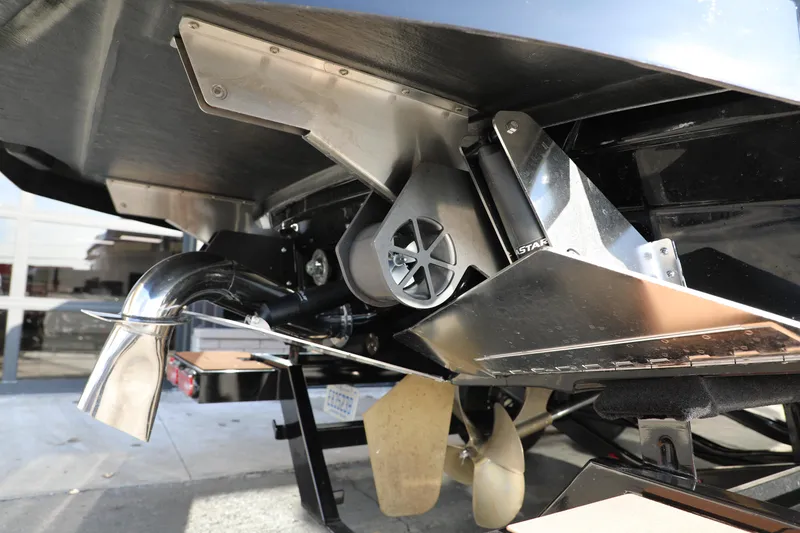 Slide: The Image of 2023 Supra SL boat's advanced propulsion system and propeller detail. - 27