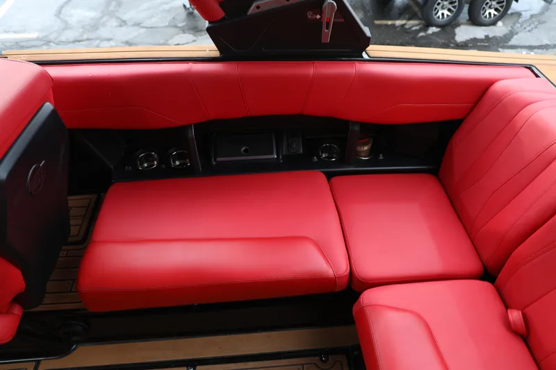 Slide: The Image of 2023 Malibu Wakesetter 22 LSV interior with vibrant red seating and sleek design. - 24