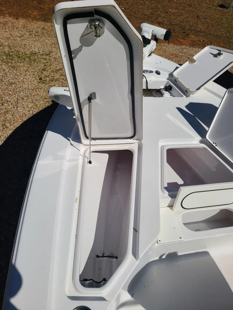 Slide: The Image of Open storage compartments on a 2018 Sportsman TOURNAMENT 214 boat deck. - 12