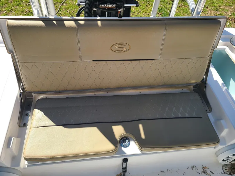 Slide: The Image of 2018 Sportsman TOURNAMENT 214 boat seat with beige upholstery and diamond stitching. - 18