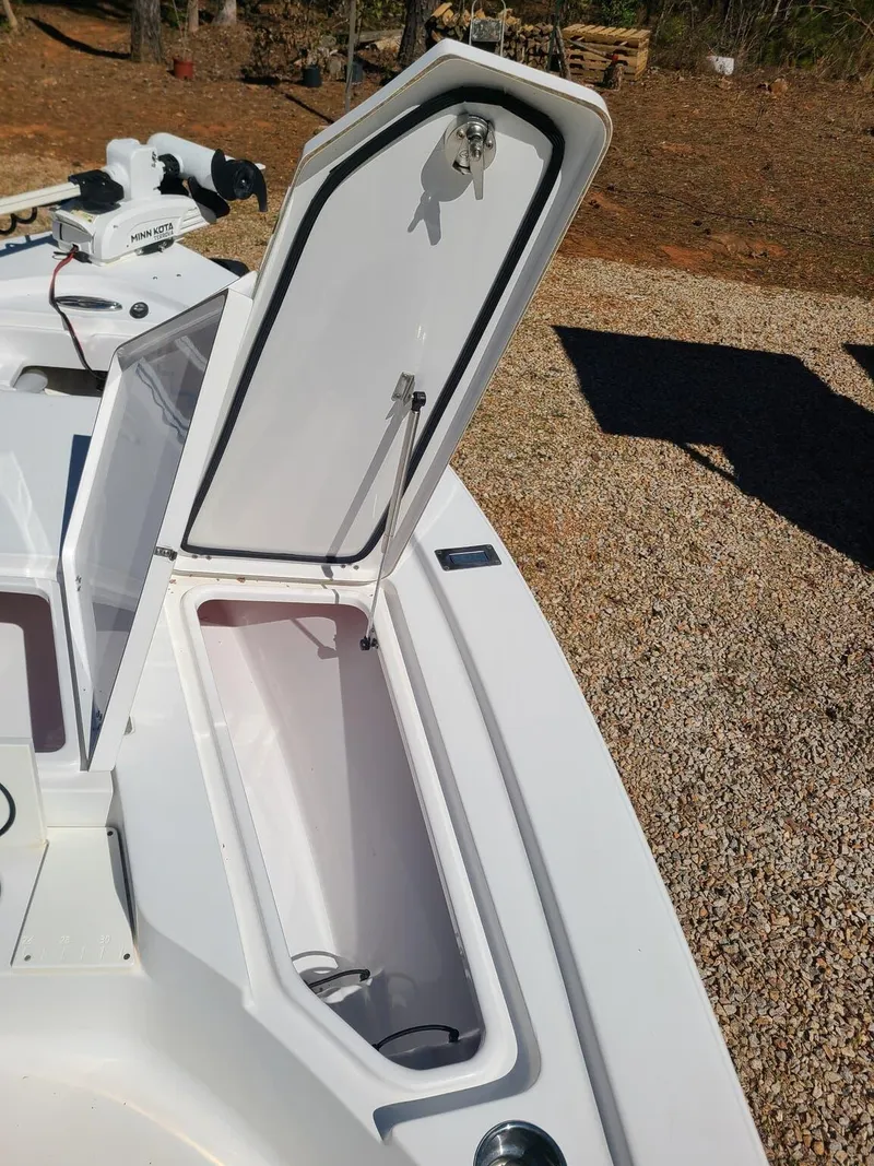 Slide: The Image of Open storage compartment on a 2018 Sportsman TOURNAMENT 214 boat. - 6